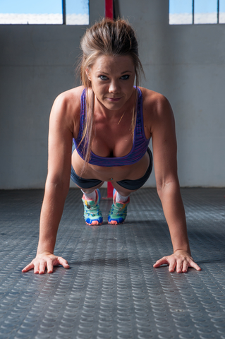 Woman Doing Burpees