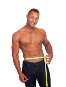 Strong Man Measuring His Waistline